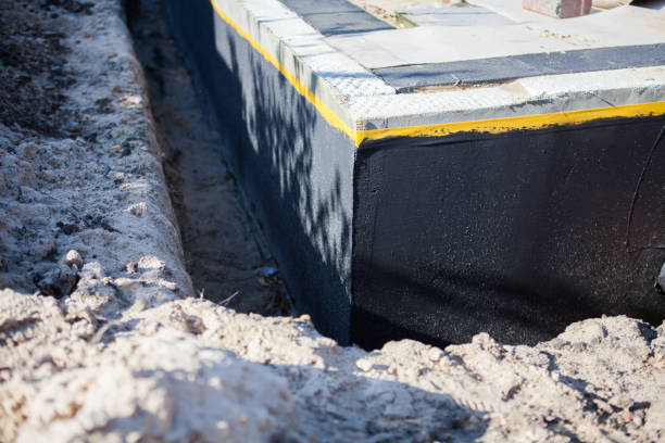 Professional Waterproofing technician working in Sterling, GA